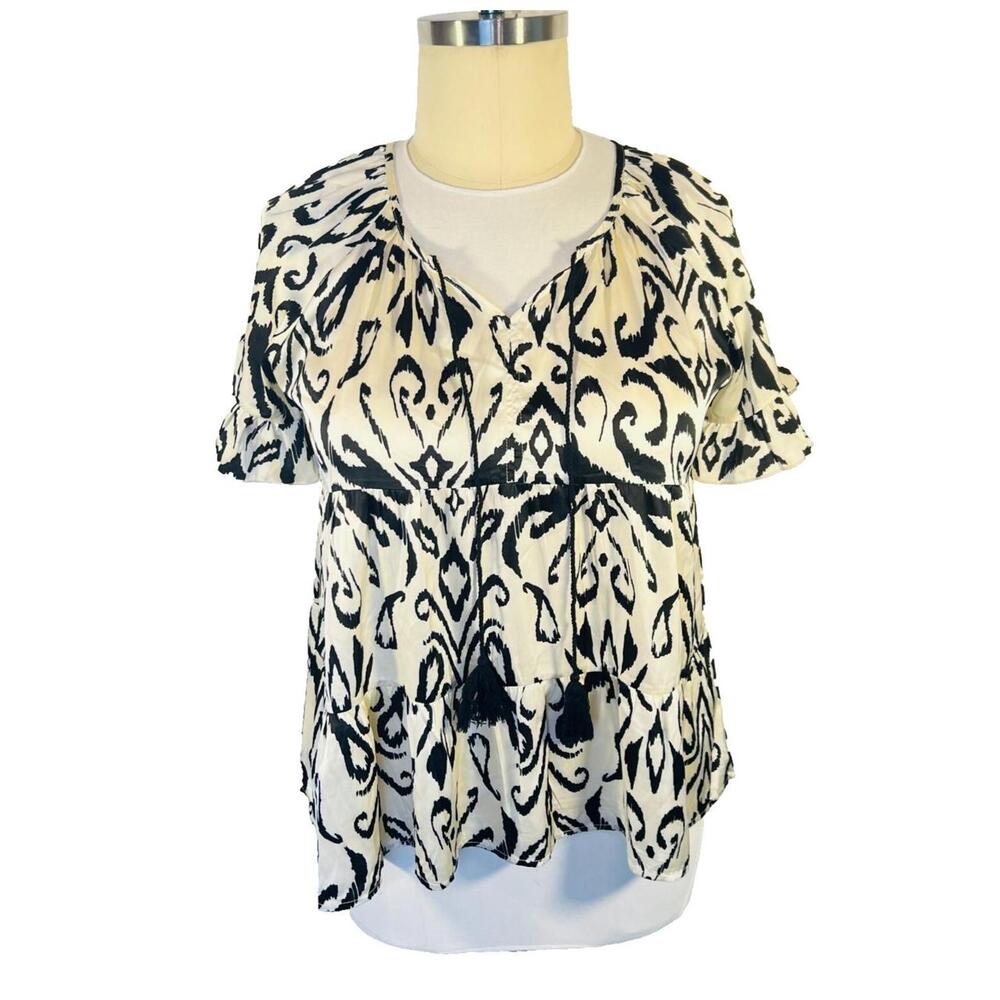 This oversized Grace & Emma Women's L Blouse features a stylish peplum style wit